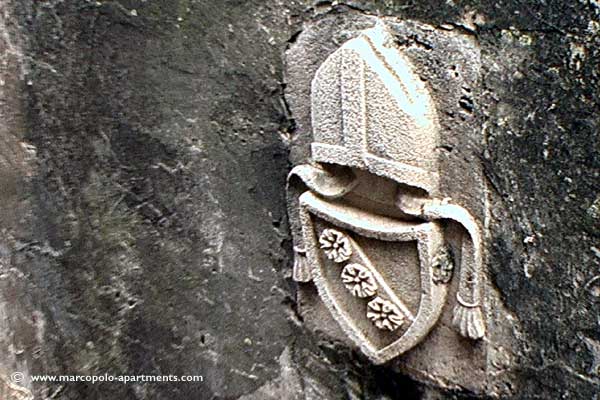 Crest at the Wall of Bishop's Treasury